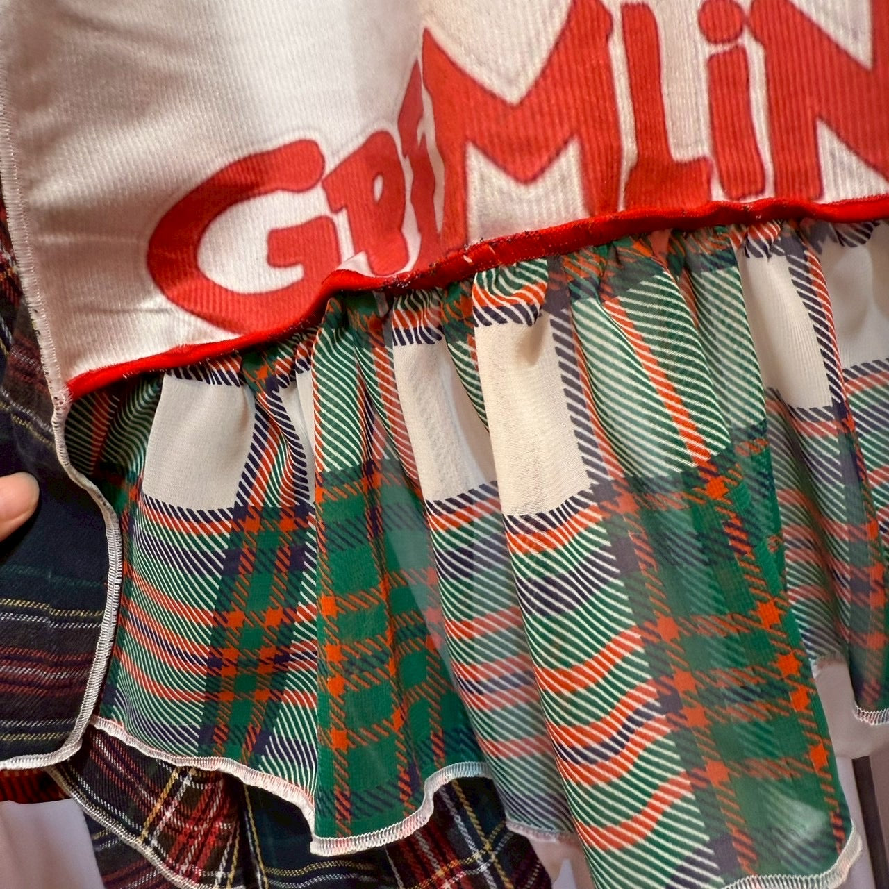 グレムリンのチェック柄トップス