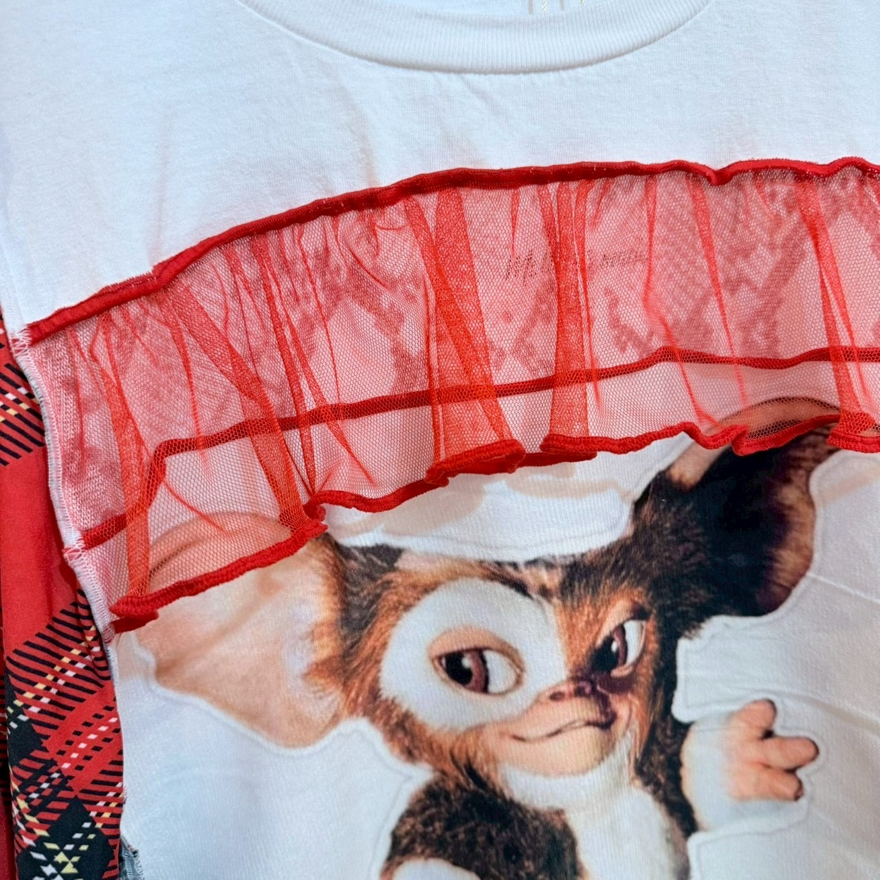 グレムリンのチェック柄トップス