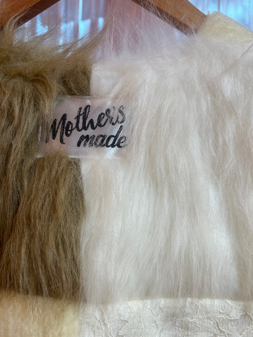 ファー xニットのパッチワークベスト